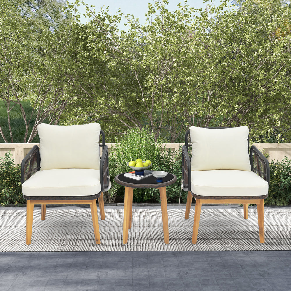 Cushioned patio chairs with acacia wood and a tempered glass side table, perfect for outdoor relaxation.