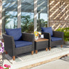 Two navy blue cushioned chairs and a wooden table from a 3-piece patio rattan bistro furniture set for outdoor use.