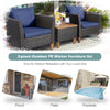 3-piece patio rattan bistro furniture set with navy cushions and wooden table top, perfect for outdoor relaxation.