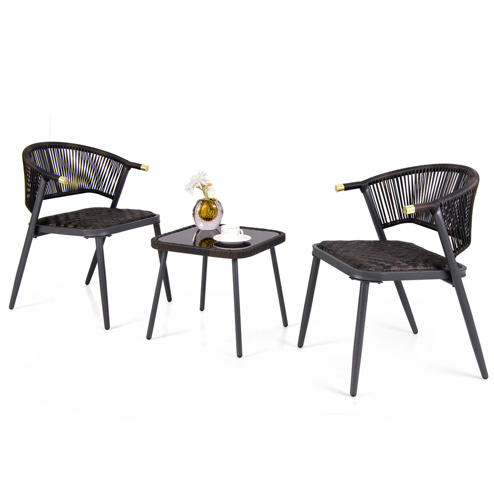 Two brown and black patio chairs with a glass-top coffee table, ideal for backyard and poolside relaxation.
