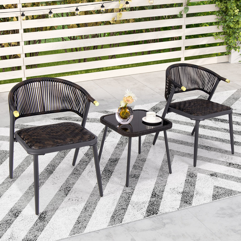 Two stylish black and brown patio chairs with a glass-top coffee table, perfect for backyard or poolside relaxation.
