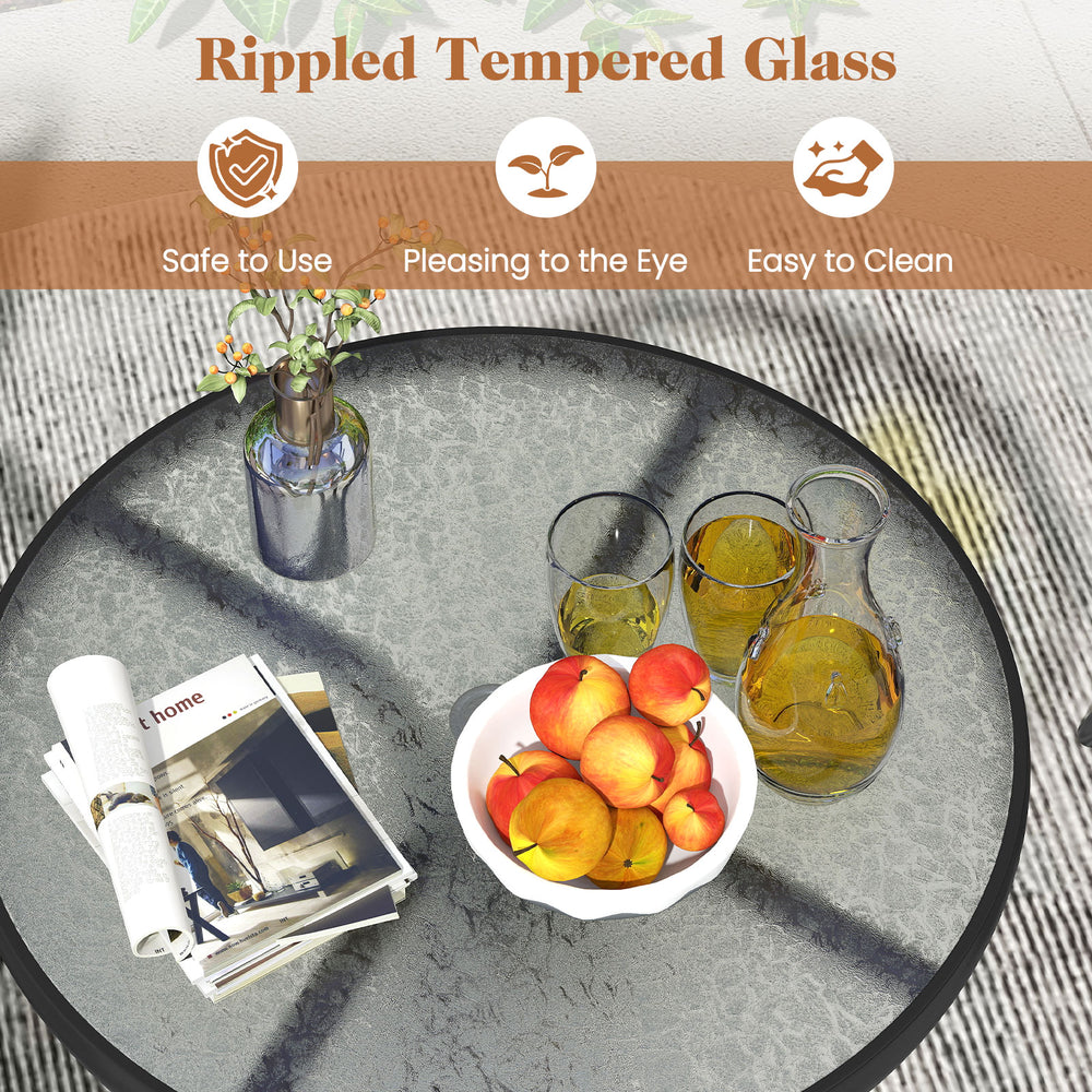 Round table with rippled tempered glass top, perfect for outdoor patios, featuring durable folding chairs for.