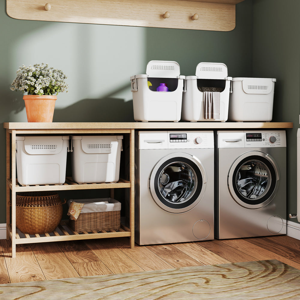 Stackable white plastic storage bins with front doors and side handles, ideal for home organization in various rooms.