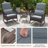Two rocking chairs with gray cushions and a 2-tier coffee table, perfect for backyard relaxation.