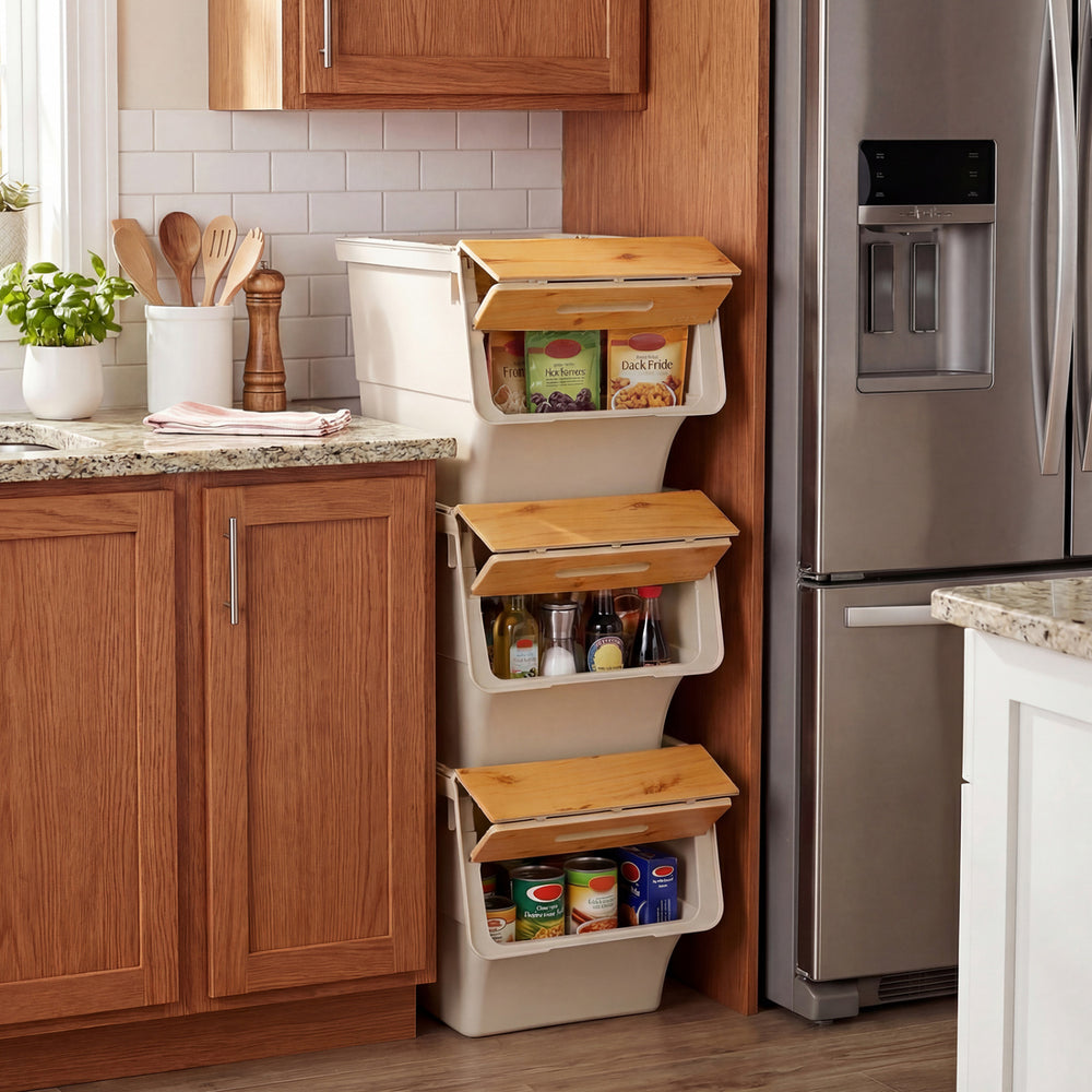 Stackable plastic storage bins with stay-open lids, 35 QT capacity, on wheels for easy mobility in kitchen organization.