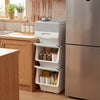 Stackable gray storage bins on wheels with stay-open lids, ideal for organizing kitchens and closets.