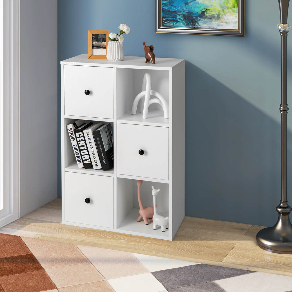 Three-tier white bookcase with six drawers, featuring smooth metal sliders and anti-toppling device for living room use.