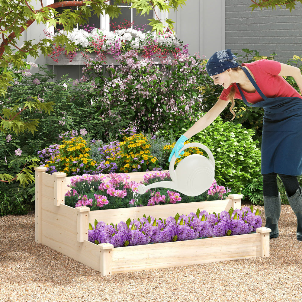 3 tier elevated wooden vegetable garden bed made of sturdy fir wood, ideal for cultivating flowers and vegetables.