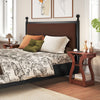 3-tier cherry end table with charging station and open storage shelves, ideal for bedroom or living room decor.