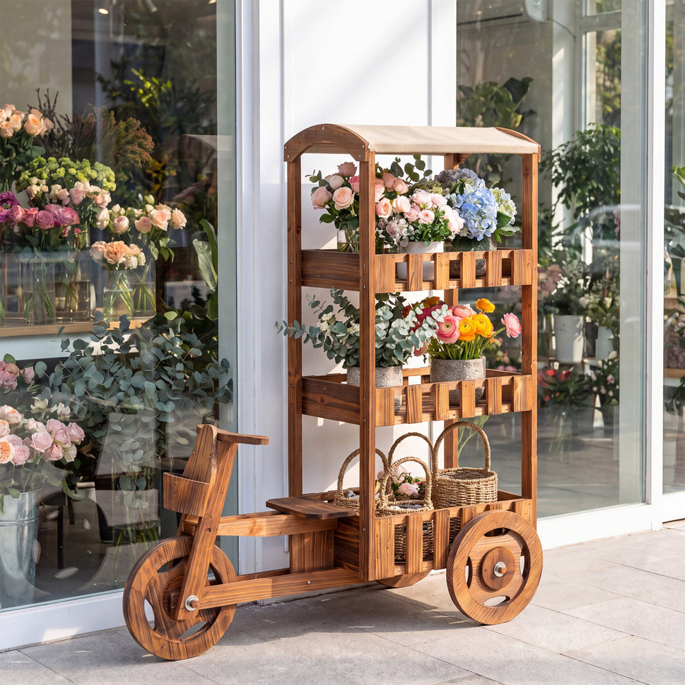 Vintage 3-tier fir wood wagon planter with a fabric canopy, perfect for displaying potted plants in gardens or patios.