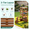 3-tier fir wood wagon planter features a vintage design, ideal for displaying potted plants and enhancing outdoor spaces.