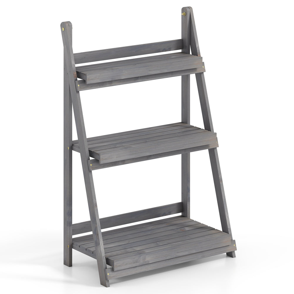 Four-tier foldable plant stand made of fir wood with slatted shelves, ideal for displaying plants in any space.
