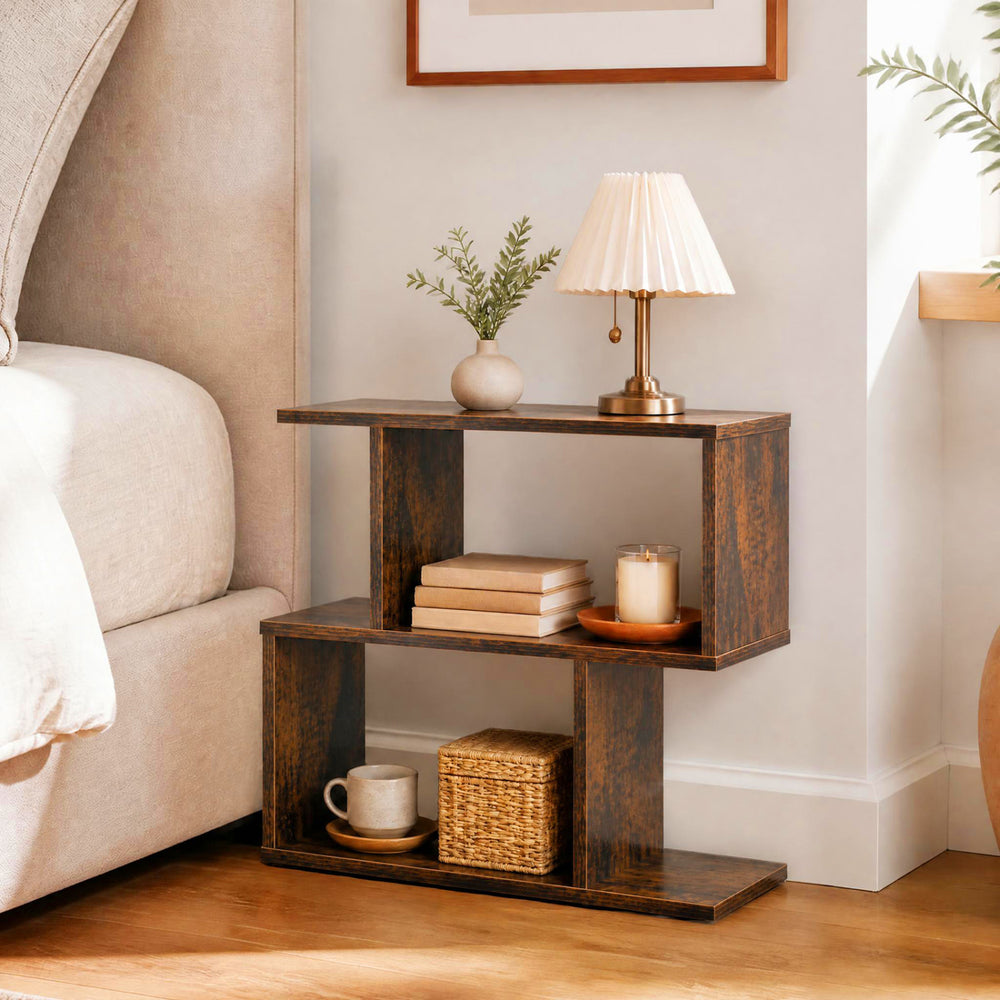 Compact 3-tier geometric bookshelf in brown, perfect as a side table or display shelf for books and decor.