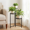 3-tier metal plant stand with a triangular frame, perfect for corner display of pots and decorations in indoor spaces.