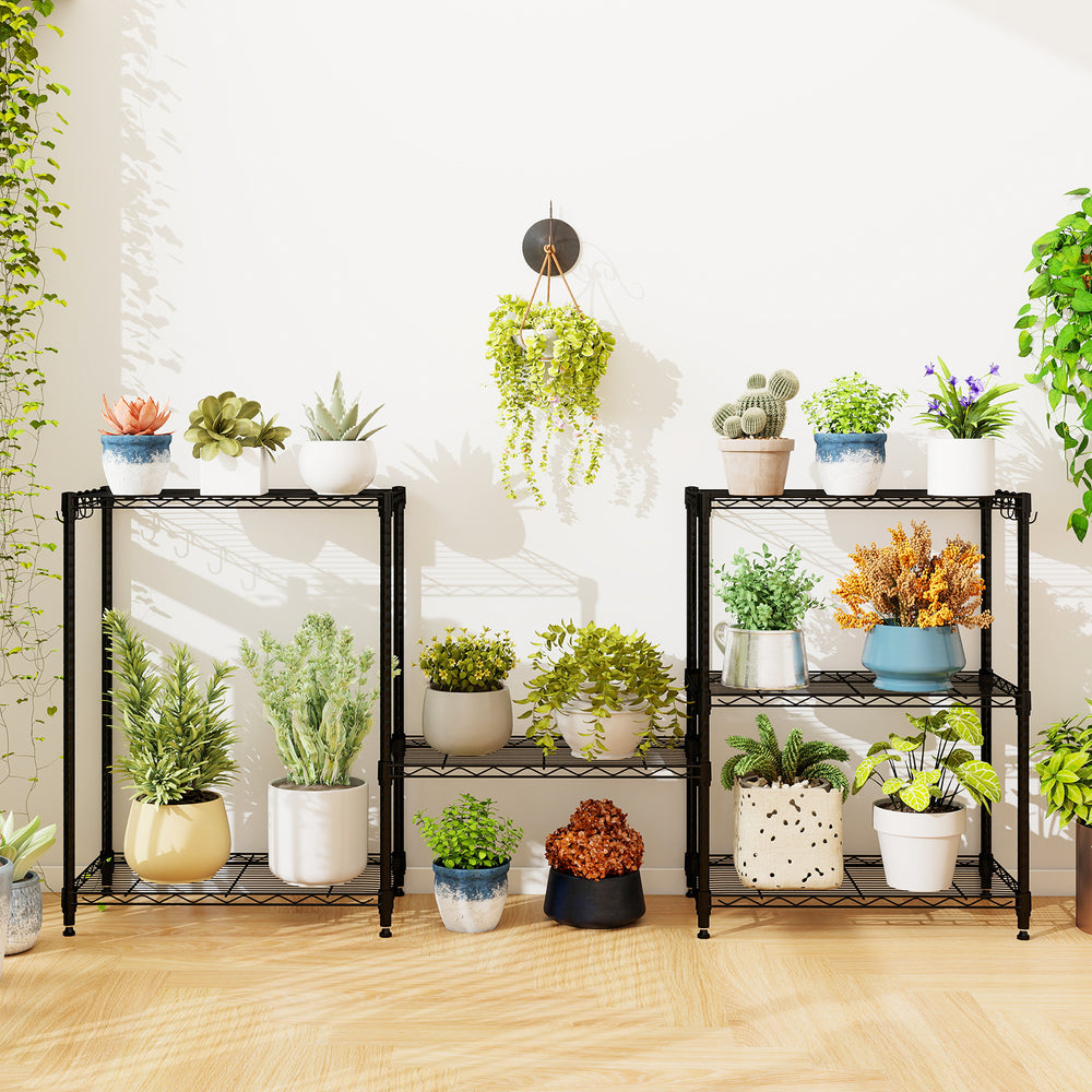 3-tier black metal shelving unit set of 2 displaying various potted plants, ideal for indoor gardening and organization.