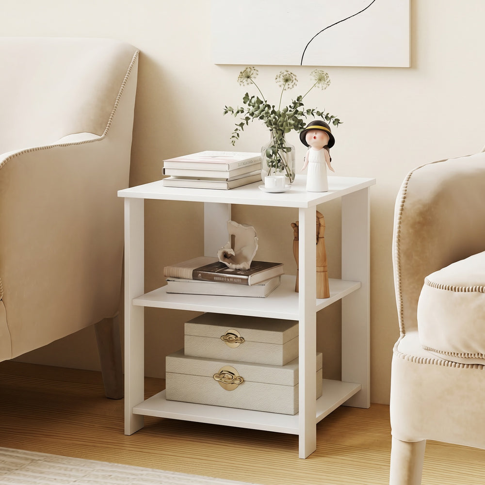 Modern white 3-tier side table featuring open storage shelves, perfect for decorative accents and easy access in small.