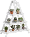 3-tier white plant stand made of solid fir wood, showcasing potted plants for indoor or outdoor use in compact spaces.