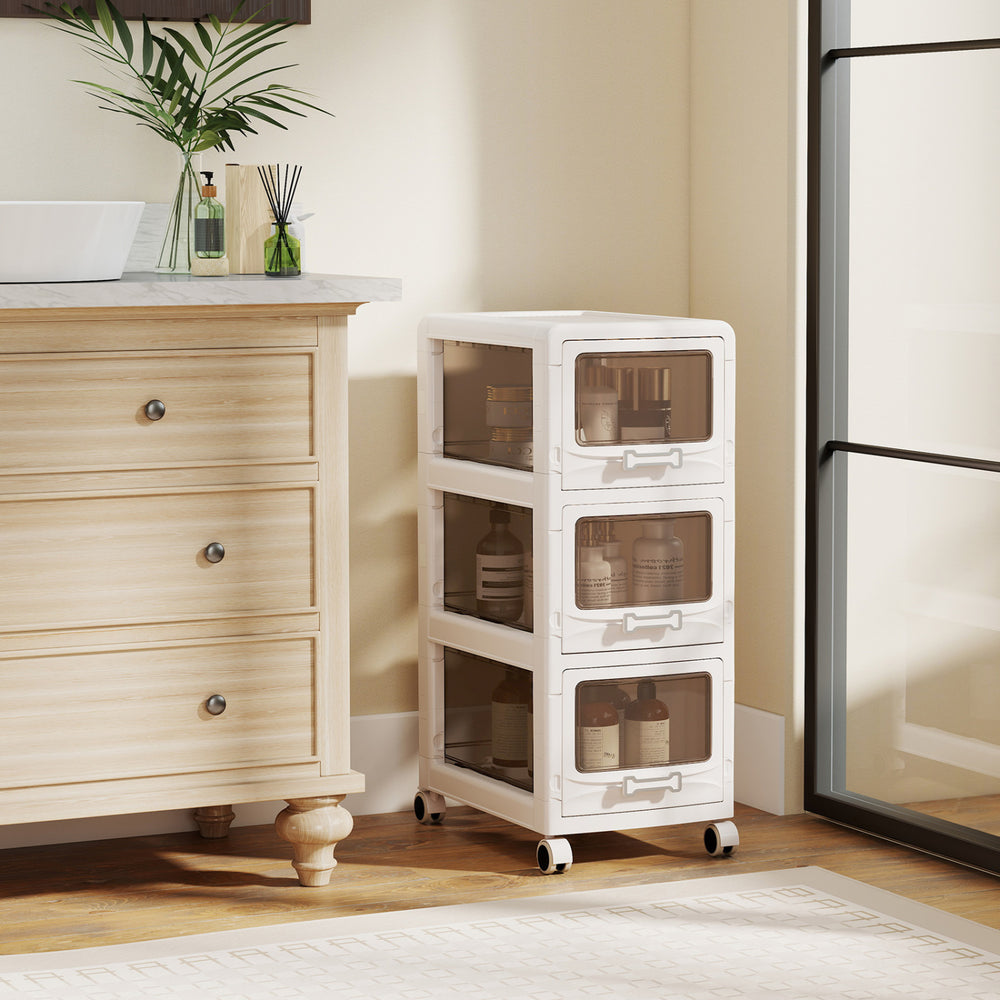 3-tier plastic drawer storage organizer cart with lockable wheels, ideal for bathroom or kitchen organization.