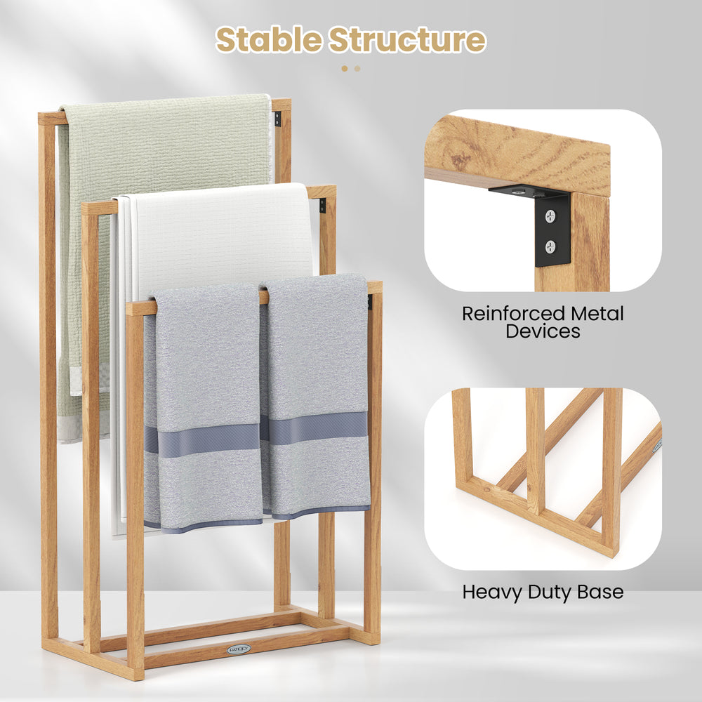 3-tier teak wood towel rack with hanging crossbars, featuring a stable base and natural texture for effective drying.