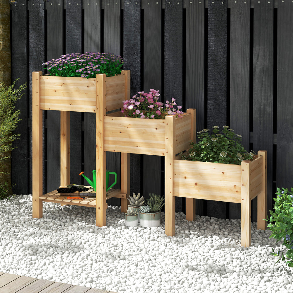 3-tier wooden raised garden bed made of natural fir wood with open storage shelf, ideal for growing flowers and herbs.