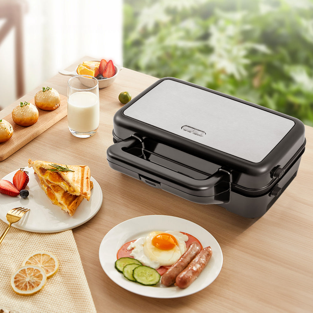 3-in-1 sandwich maker with removable non-stick plates, featuring grilling and waffle options for versatile cooking.