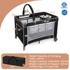 3-in-1 portable baby crib and playpen in black with changing table, mesh walls, and detachable toy bar for infants.