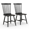 Two black Windsor chairs with high spindle backs and wide seats, perfect for a dining set or additional seating.