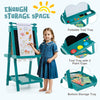 Double-sided art easel in green with chalkboard and magnetic whiteboard, featuring foldable tool tray and storage space.