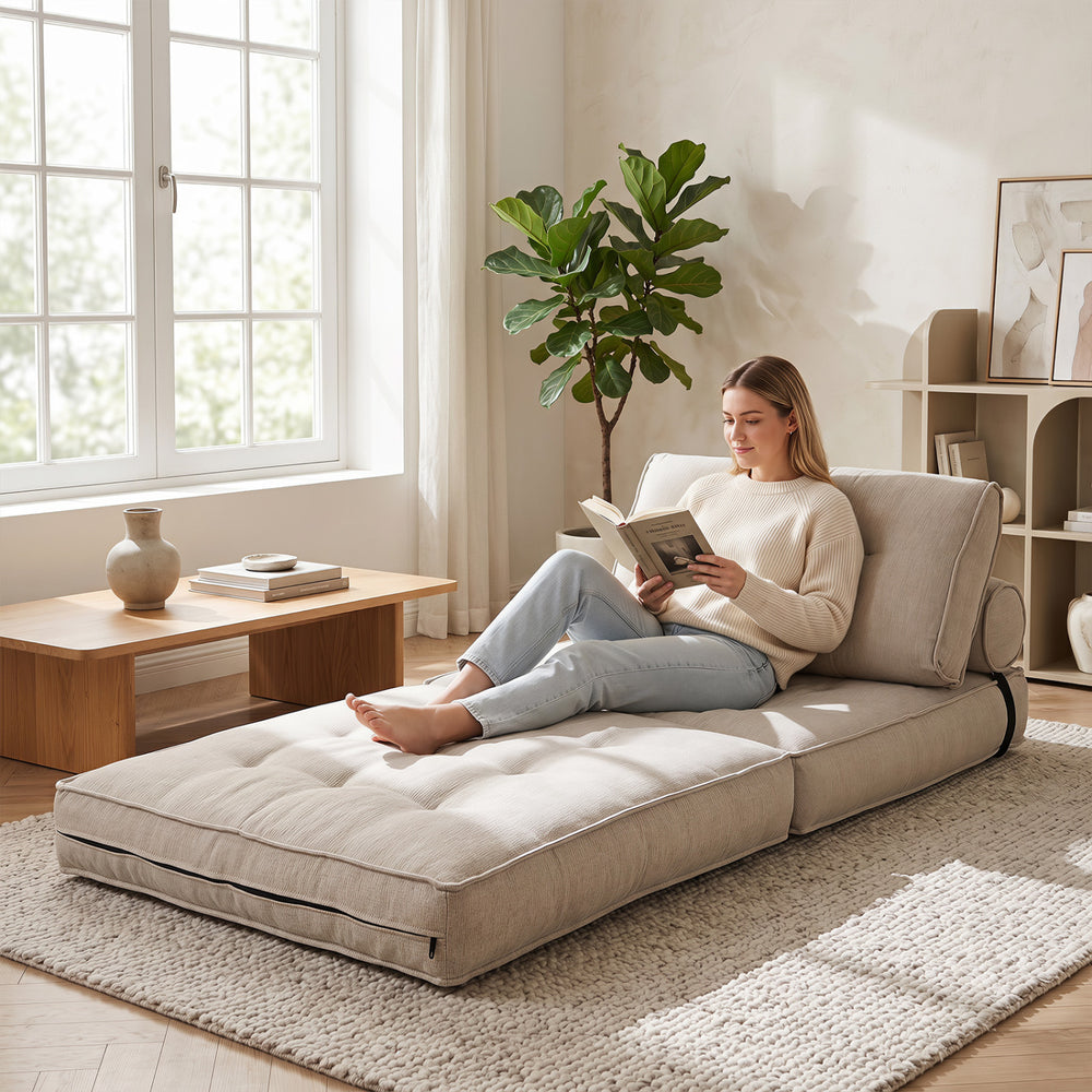 3-in-1 beige folding sofa with bolster, convertible to a bed, perfect for living rooms or guest rooms.