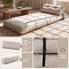 Folding sofa bed in beige with bolster and pillow, featuring a 3-in-1 design for versatile use in living rooms or bedrooms.