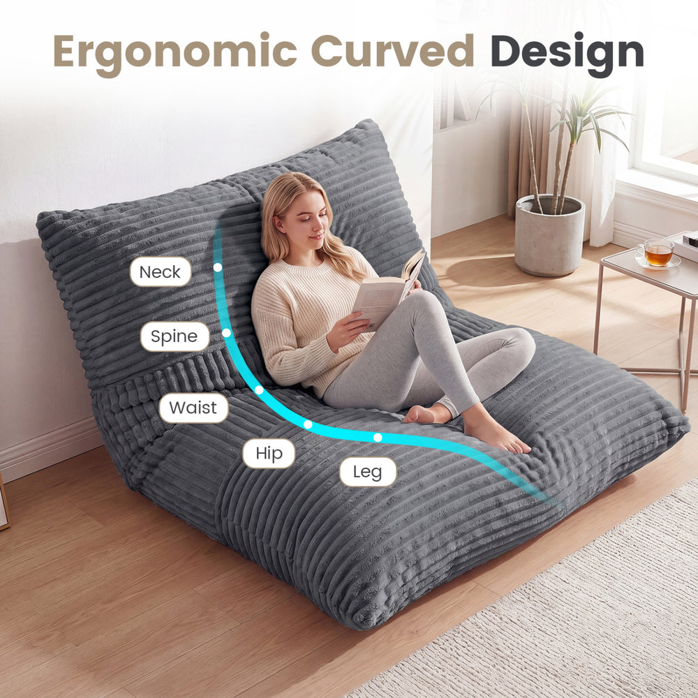 Large 3-in-1 bean bag chair in grey with ergonomic curved design for optimal comfort in living room or bedroom.