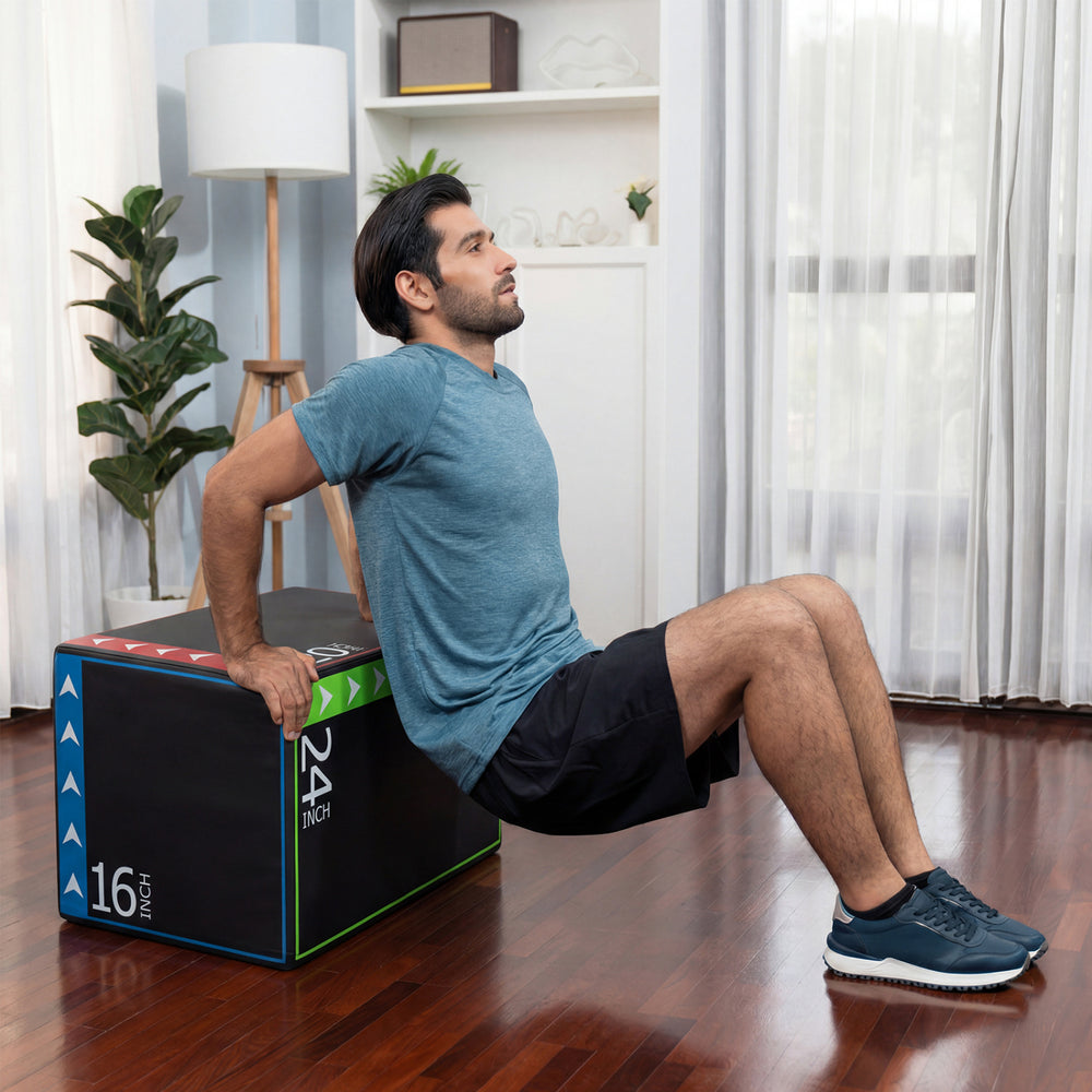 Man performing dips on a 3-in-1 plyometric box, featuring resilient EPE foam and height options of 16, 20, or 24 inches.