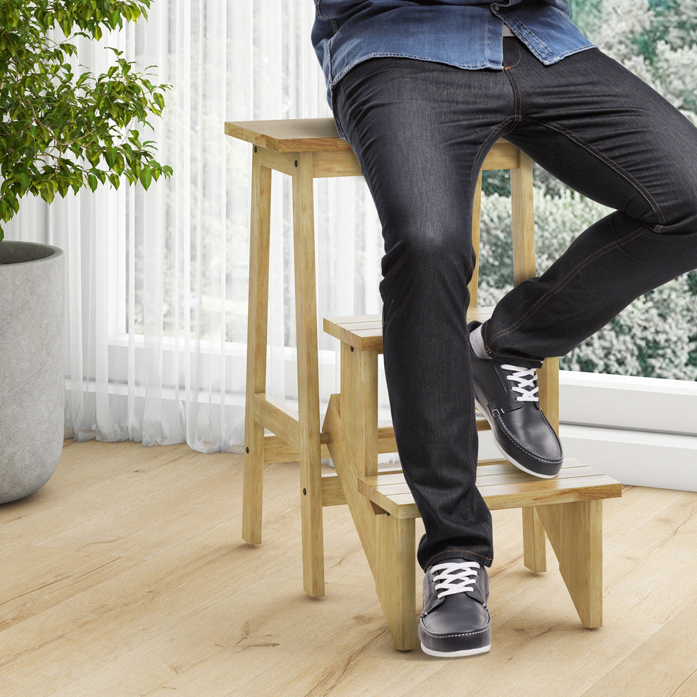 Natural rubber wood 3-in-1 step stool with anti-slip surface, used as a stool or ladder for convenient access.