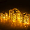 Three illuminated Christmas gift boxes with 50 LED lights, featuring detachable bows, for festive indoor or outdoor.