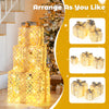 Three lighted Christmas gift boxes with 50 LED lights, featuring detachable bows, for elegant indoor and outdoor.