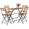 5-piece patio dining set featuring acacia wood table and 4 folding chairs, perfect for outdoor use.