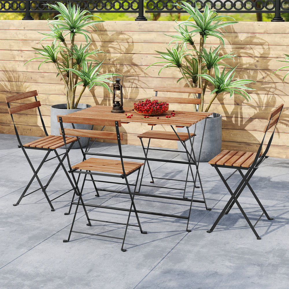 5-piece patio dining set featuring acacia wood tabletop and 4 folding chairs, perfect for outdoor use.