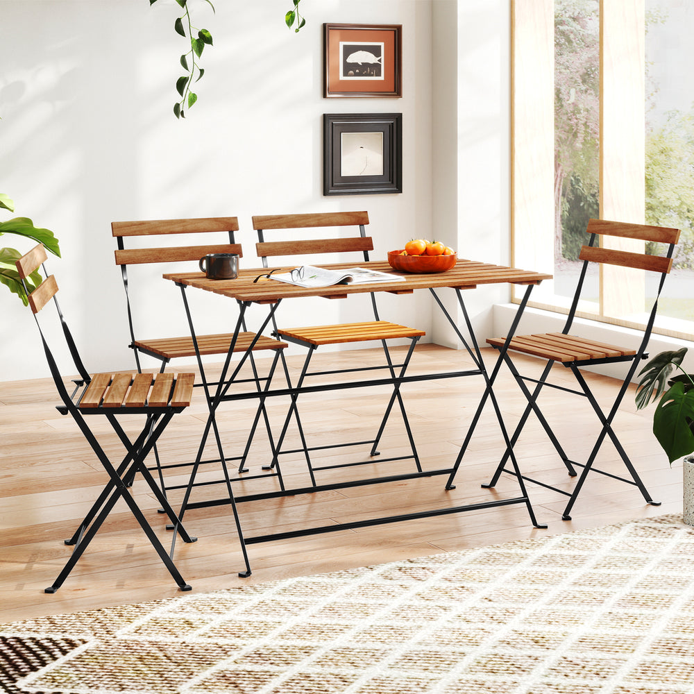 5-piece patio dining set featuring acacia wood tabletop and folding chairs, perfect for indoor or outdoor use.