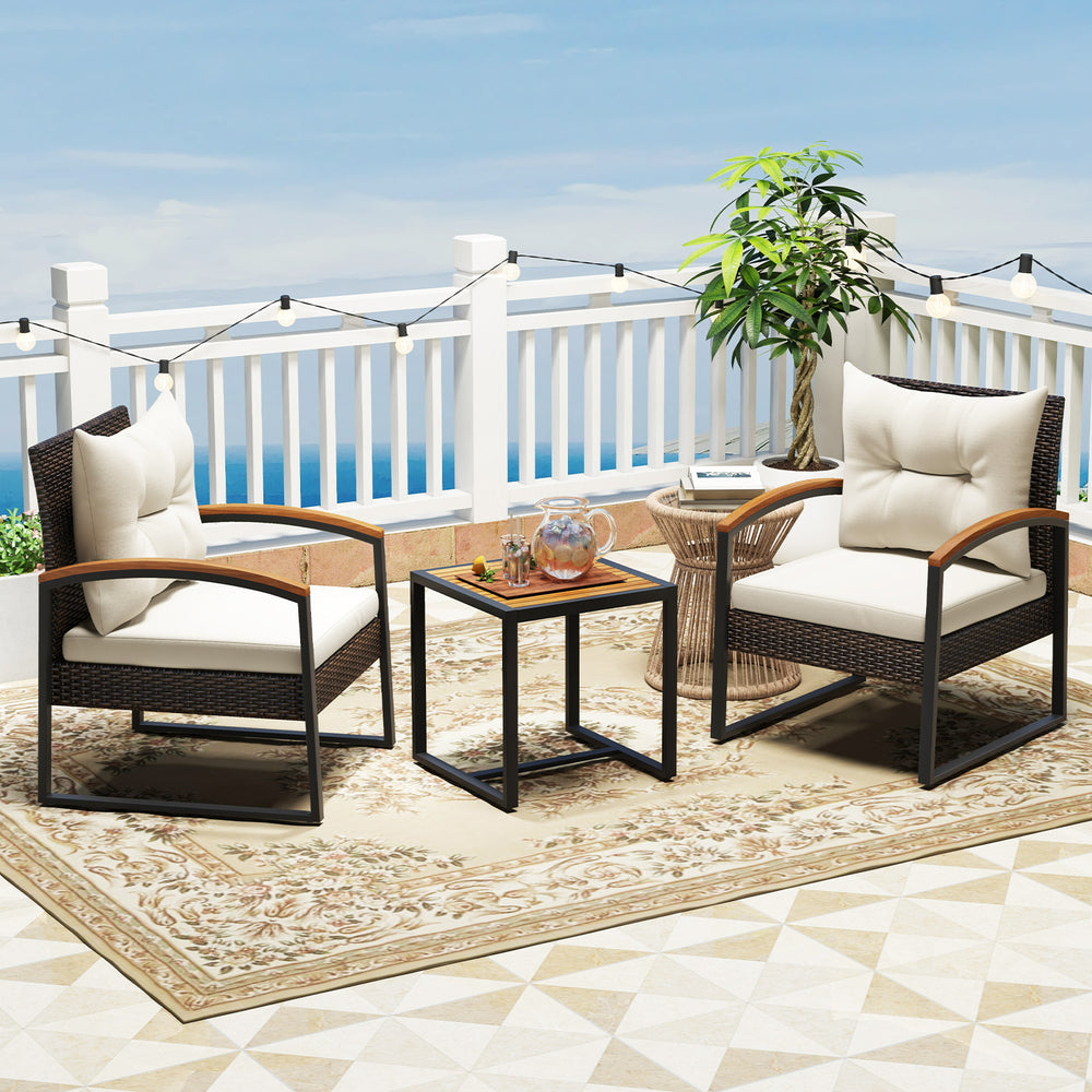 Two cozy chairs with acacia wood armrests and a square coffee table, perfect for outdoor patio relaxation.