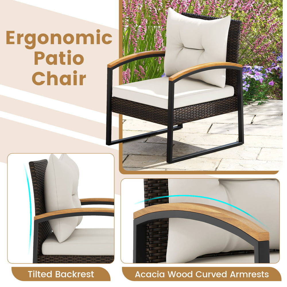 Ergonomic patio chair with acacia wood armrests, PE rattan, and cozy cushions, perfect for backyard relaxation.