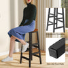 Bar table set featuring a sturdy structure, smooth wood surface, and ergonomic footrests, perfect for kitchen or dining.