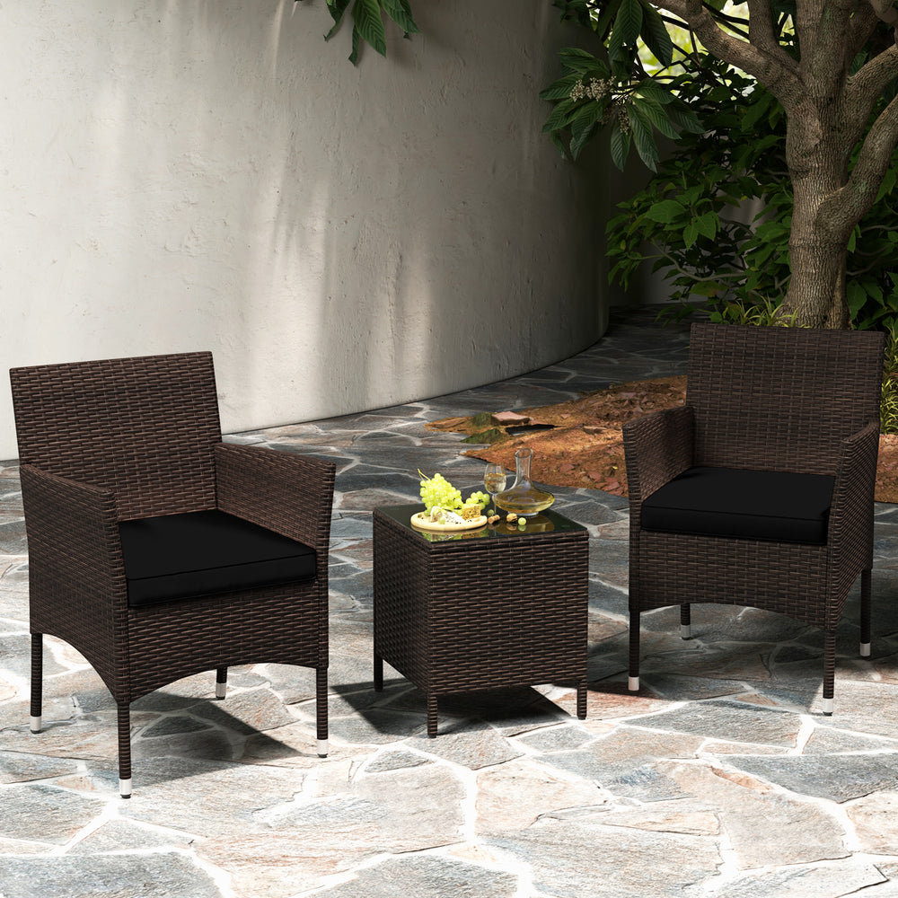 Cushioned seat detail of the outdoor chair from the 3-piece conversation set, featuring durable rattan for comfort.