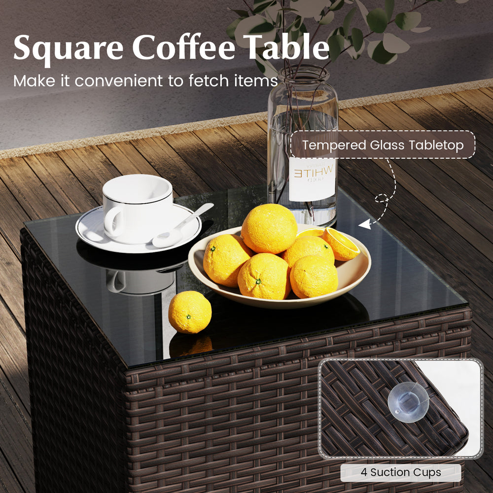 Square coffee table with tempered glass tabletop and rattan surface, perfect for outdoor relaxation and convenience.