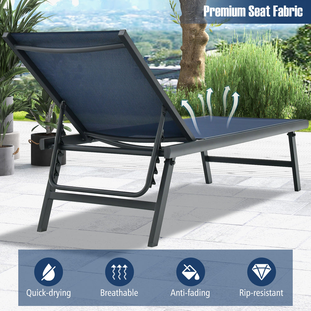 Navy chaise lounge chair with adjustable backrest and breathable fabric, perfect for poolside relaxation.