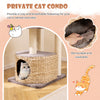 Cozy cat condo with removable, washable cushions and sisal scratching posts for playful relaxation and comfort.