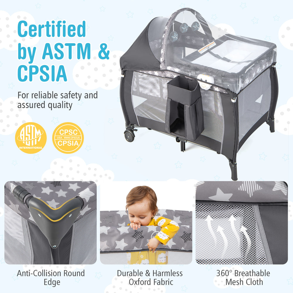 Portable baby nursery center in gray with removable changing table, detachable canopy, and breathable mesh for safety.