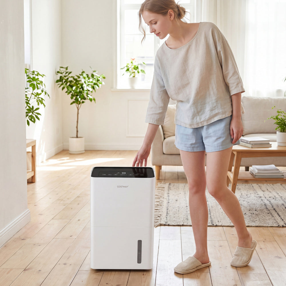 Dehumidifier with a sleek design, 80 pint capacity, and intuitive control panel for efficient home humidity management.