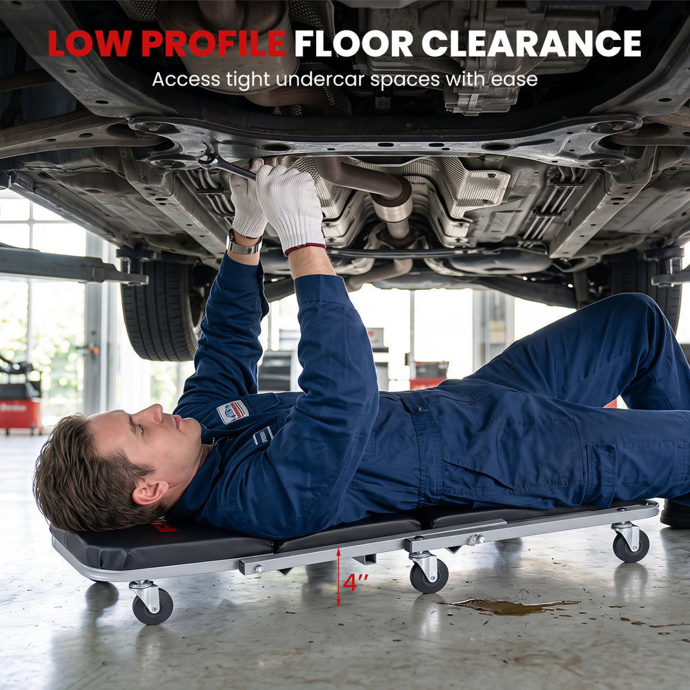Mechanic creeper with 4" low profile floor clearance and 6 swivel casters for easy access under vehicles.