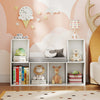 Kids bookshelf with reading nook, 6 open cubes, white finish, perfect for books and toys in a nursery or kids' room.