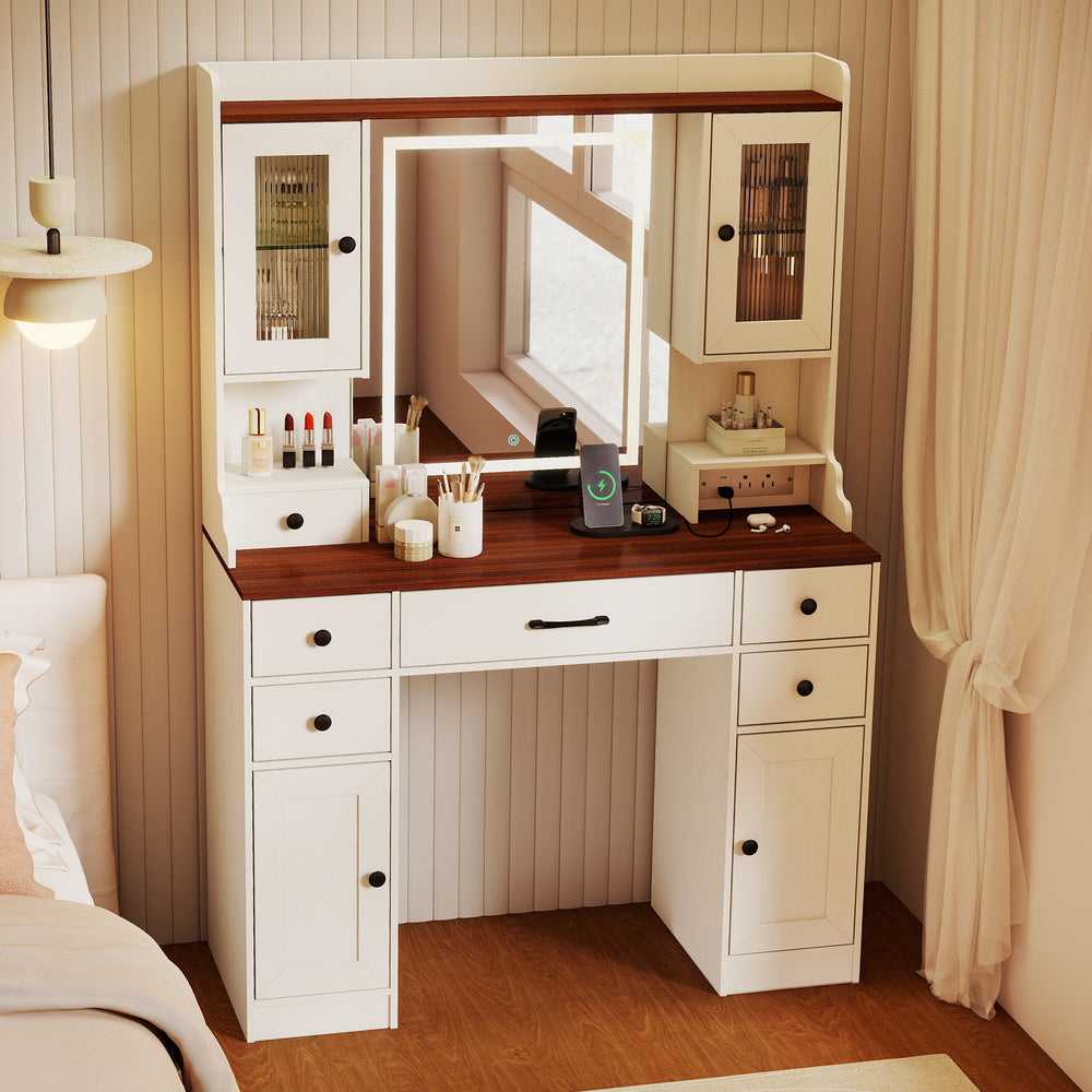 Makeup dressing table with lighted mirror, storage drawers, and power outlets, perfect for bedrooms or dressing areas.